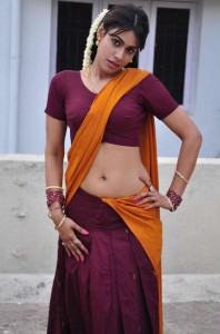 Actress Kanishka Hot Navel Pics in Half Saree From Moovar Tamil Movie