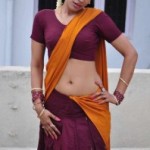 Kanishka Hot Navel Show Photos in Moovar Tamil Movie